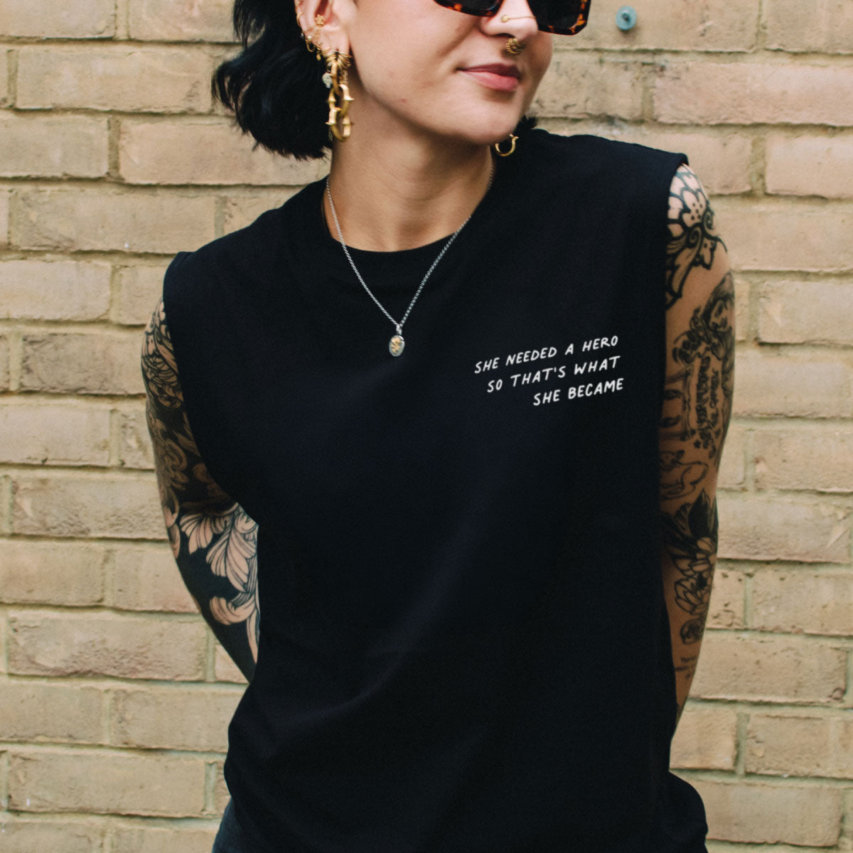She Needed A Hero So That's What She Became Sleeveless T-Shirt-Feminist Apparel, Feminist Clothing, Feminist Sleeveless T Shirt, EP01S-The Spark Company